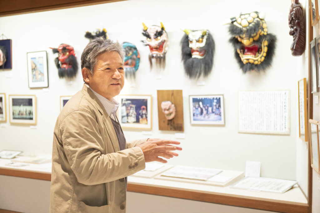 Person at an oni exhibit